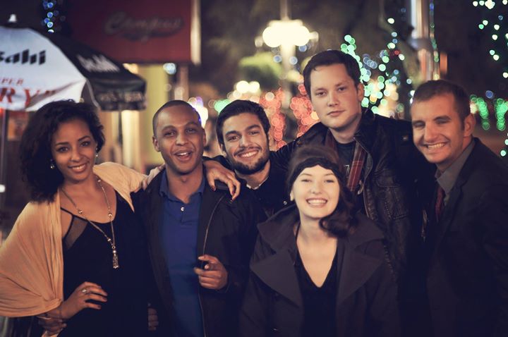 A group of friends pose for a picture in Main Gate Square